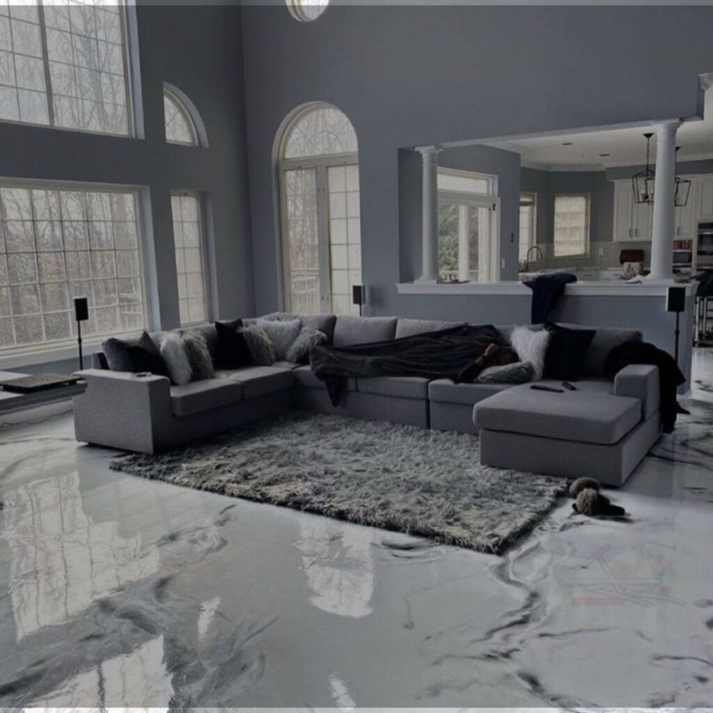 Elegant living room featuring glossy residential Epoxy Flooring North Port FL with a marble-inspired finish.