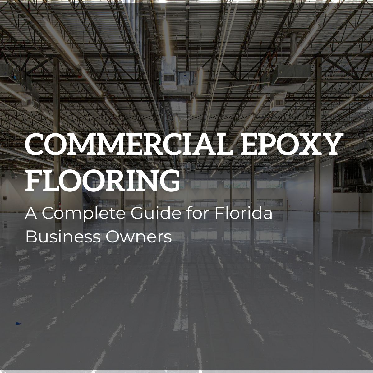 Glossy commercial epoxy flooring inside a large industrial warehouse in Florida.