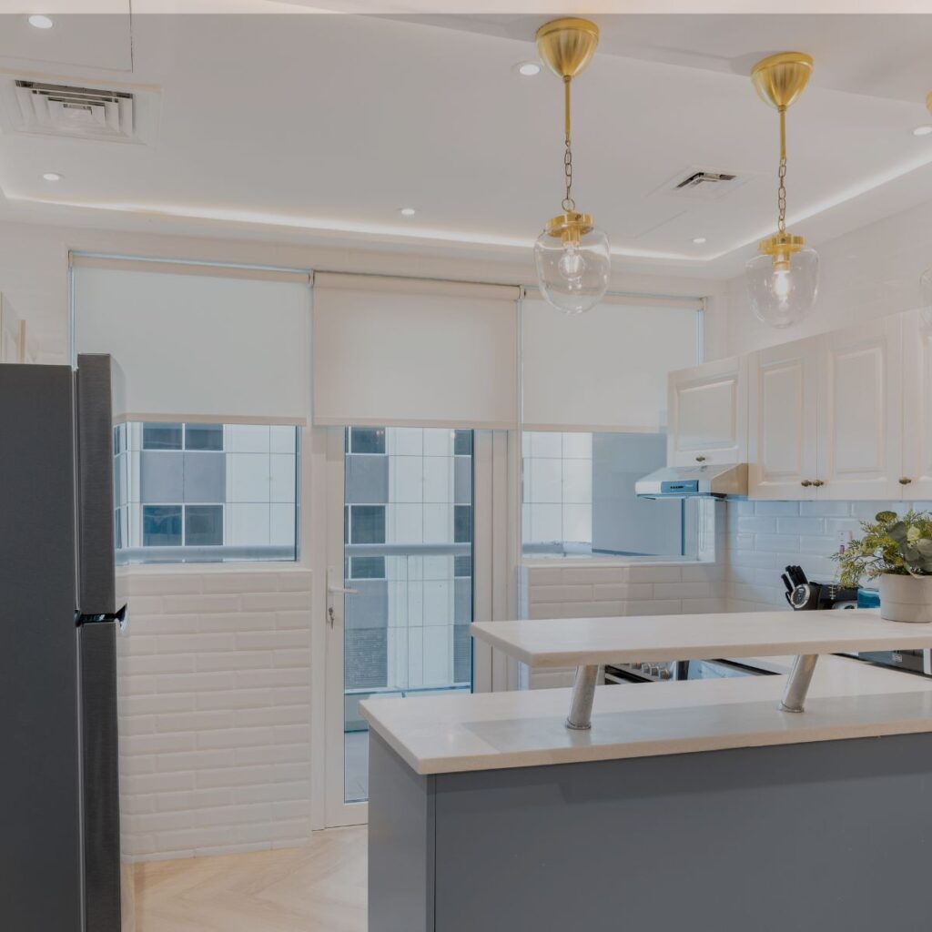 Bright modern kitchen featuring durable epoxy flooring in Bradenton, FL.