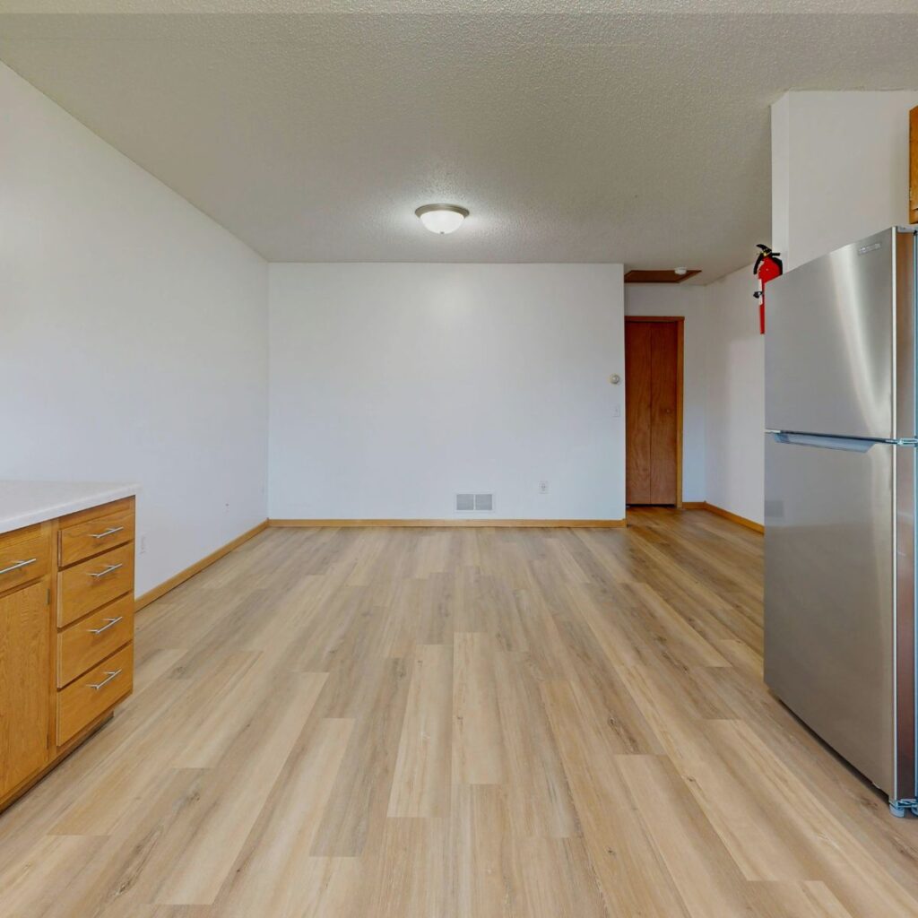 Epoxy flooring in a Tampa, FL kitchen with a durable wood-look finish.